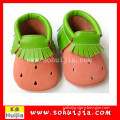 2015 best selling high quality moccasins sweet tassels leather breathable baby girl shoes